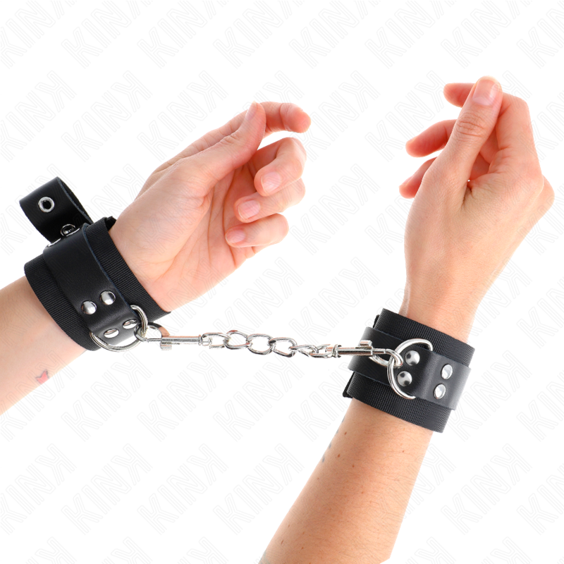 KINK - SUJECIONES DE MUÑECA DE NYLON NEGRAS CON CINTURÓN DE CUERO NEGRO AJUSTABLE 19-29 CM X 5.1 CM