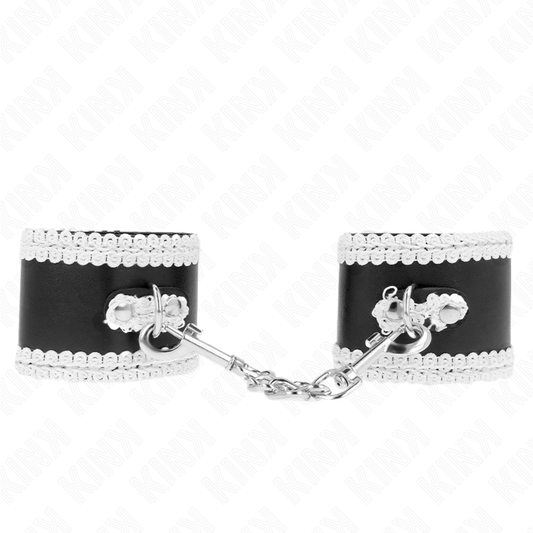 KINK - SUJECIONES DE MUÑECA NEGRAS CON ENCAJE DECORADO BLANCO AJUSTABLE 20-23 CM X 5,5 CM